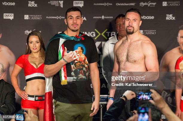 Alexander Flores and Joseph Parker pose during the weigh in ahead of the bout between Joseph Parker and Alexander Flores on December 14, 2018 in...