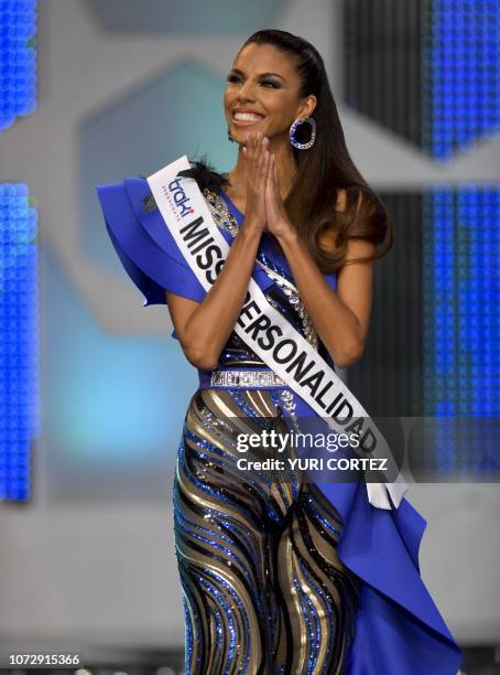 Isabella Rodriguez representative of the Portuguesa state reacts during the Miss Venezuela beauty pageant in Caracas, Venezuela on December 13, 2018....