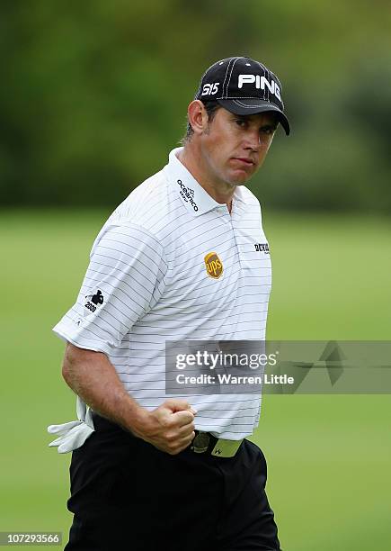 Lee Westwood of England celebrates a birdie on the third hole during the second round of the 2010 Nedbank Golf Challenge at the Gary Player Country...