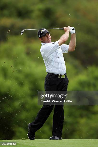 Lee Westwood of England plays his second shot on the third hole during the second round of the 2010 Nedbank Golf Challenge at the Gary Player Country...