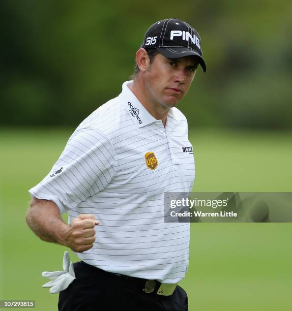 Lee Westwood of England celebrates a birdie on the third hole during the second round of the 2010 Nedbank Golf Challenge at the Gary Player Country...