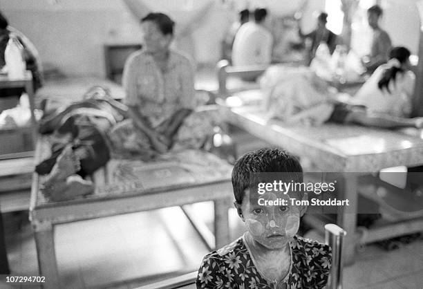 Year-old Moe Nin Phun wearing traditional Burmese face make-up photographed in the In Patients ward at the Mae Tao Clinic in Mae Sot, Thailand. The...