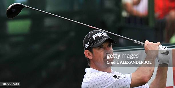 Britain's Lee Westwood tees off on the 18th hole during the 2nd day of the Nedbank Golf Challenge in Sun City on December 3, 2010 World number one...