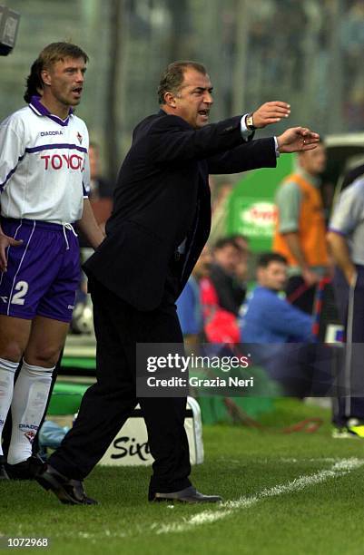 Fiorentina coach Fatih Terim issues instructions during the Brescia v Fiorentina Serie A match played at the Mario Rigamonti stadium in Brescia....