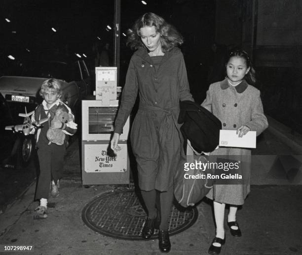 Fletcher Farrow, Mia Farrow and Soon-Yi Previn during Mia Farrow and Children Depart from Her Apartment in New York City - November 12, 1981 at Mia...