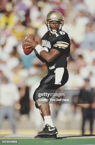 Vance Joseph, Quarterback for the University of Colorado Buffaloes prepares to throw the ball during the NCAA Big 8 college football game against the...