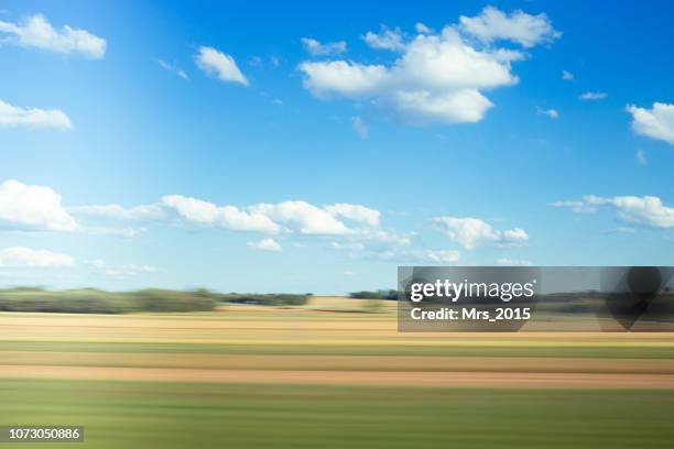 rural landscape seen from a moving train, spain - fast train stock pictures, royalty-free photos & images