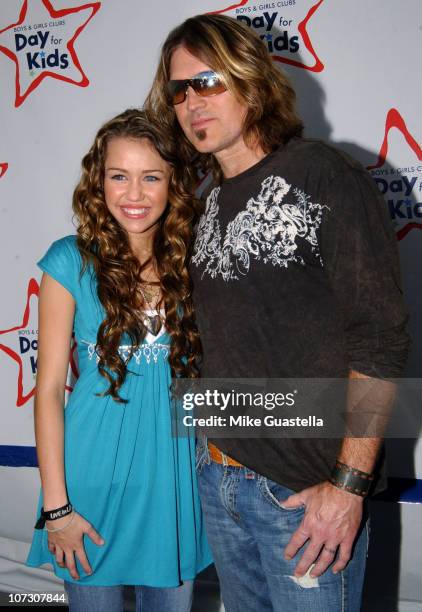 Miley Cyrus and Billy Ray Cyrus during Billy Ray Cyrus and Miley Cyrus Host National Boys & Girls Club Day for Kids - September 16, 2006 at Santa...