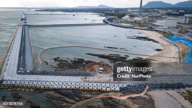 In this aerial image, land reclamation work begin at Henoko district on December 14, 2018 in Nago, Okinawa prefecture, Japan.