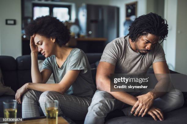 african american couple having problems in their relationship at home. - dificuldades em relações imagens e fotografias de stock