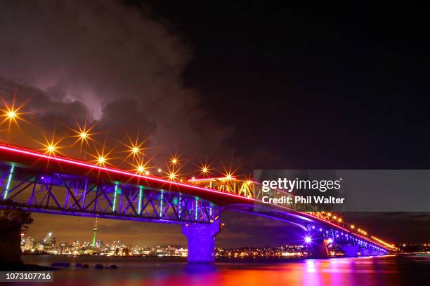 The Auckland Harbour Bridge is pictured lit up with Christmas lights on December 15, 2018 in Auckland, New Zealand. Vector Lights is counting down...