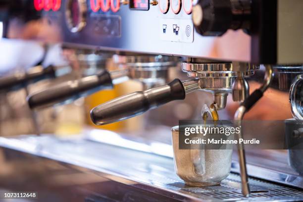 Espresso Machine As Used By A Barista In A Coffee Shop High-Res