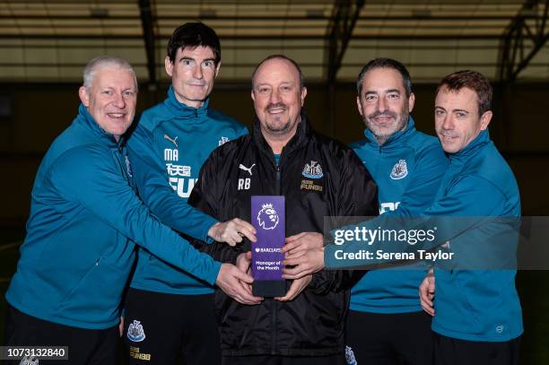 Newcastle United Manager Rafael Benitez poses for photographs with his staff seen L-R Newcastle United Goalkeeping Coach Simon Smith, Newcastle...