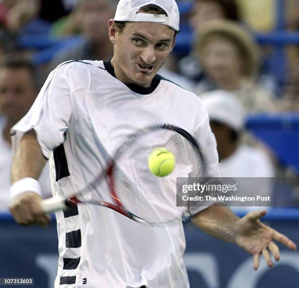 Sp_legg 8/4/06 182635 LEGG MASON TENNIS CLASSIC Post Photos by Rich Lipski/TWP Wesley Moodie tries to return volley against Marat Safin during the...