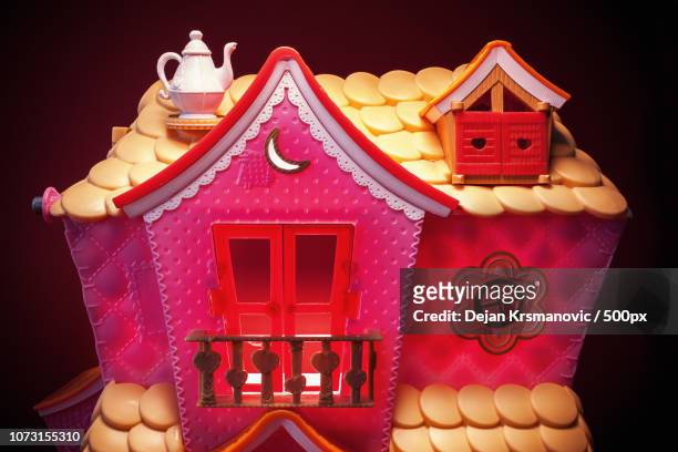 pink house toy - gingerbread house cartoon stock pictures, royalty-free photos & images