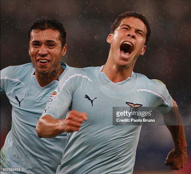Hernanes of SS Lazio celebrates with Francelino Matuzalem after scoring the third goal during the Serie A match between SS Lazio and FC...