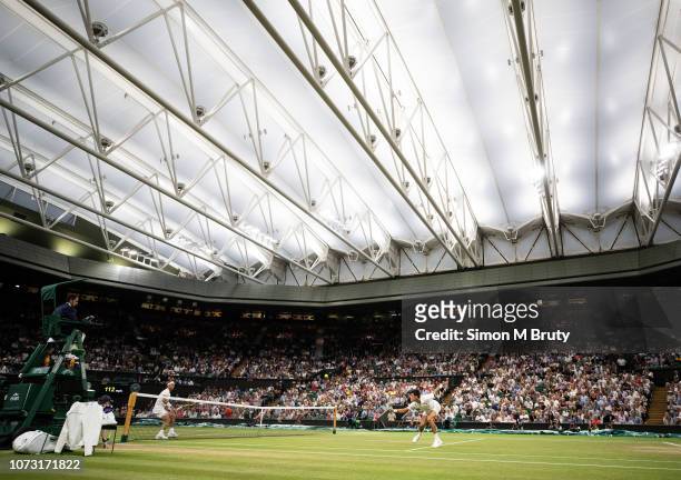 Novak Djokovic from Serbia in action against Rafael Nadal from Spain during The Wimbledon Lawn Tennis Championship at the All England Lawn Tennis and...