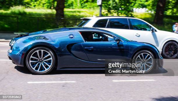 The Bugatti Veyron in London, England. The Veyron is named after the racing driver Pierre Veyron. The owner, Afzal Kahn, owner of Kahn Design, has...