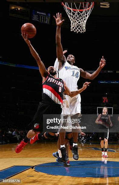 Patrick Mills of the Portland Trail Blazers shoots against Al Thornton of the Washington Wizards at the Verizon Center on December 3, 2010 in...