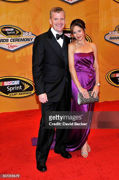 Driver Jeff Burton arrives with his wife Kim at the NASCAR Sprint Cup Series awards banquet at the Wynn Las Vegas Hotel on December 3, 2010 in Las...