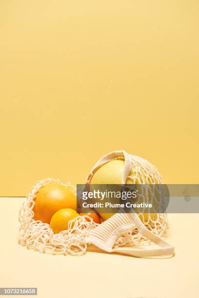 Citrus fruits in mesh bag