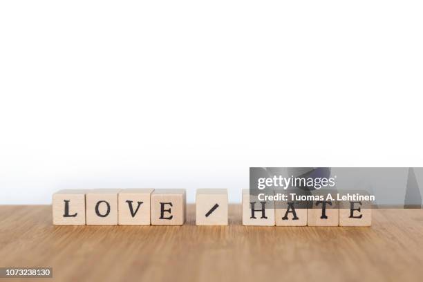 words made of wooden dice - hate enskilt ord bildbanksfoton och bilder