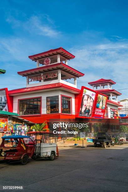china town in puerto princesa city, palawan, philippines - filipino tricycle stock pictures, royalty-free photos & images