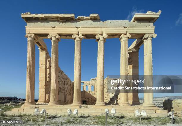 close-up, front view of the erechtheion, porch of the caryatids, temple of athena and poseidon, acropolis, athens, greece - kolonnade stock-fotos und bilder