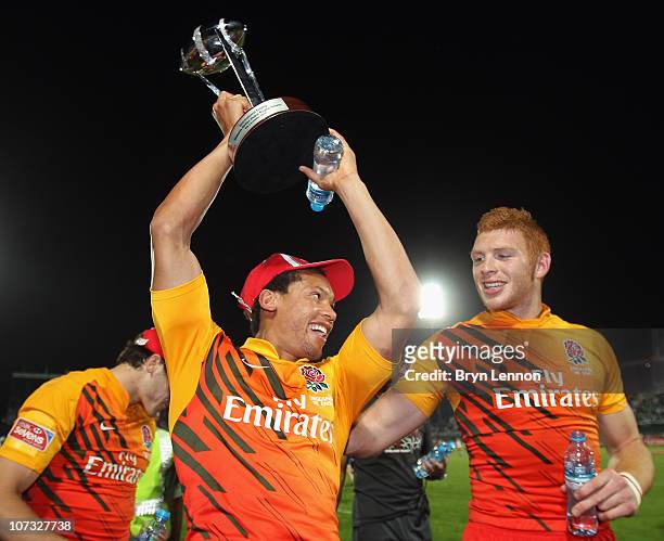 England players Dan Norton and James Rodwell celebrate winning the Dubai Rugby Sevens Cup Final, the opening tournament of the HSBC Sevens World...