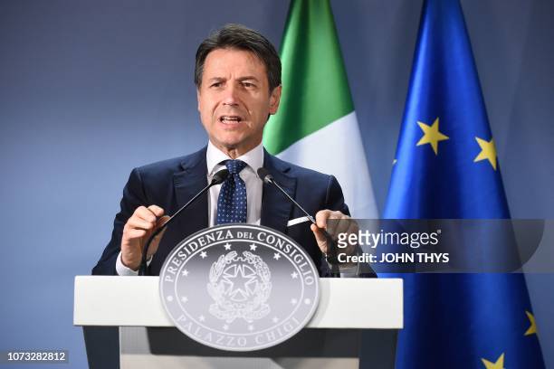 Italian Prime Minister Giuseppe Conte holds a press conference after the European Council on December 14 in Brussels. - EU leaders will approve a...