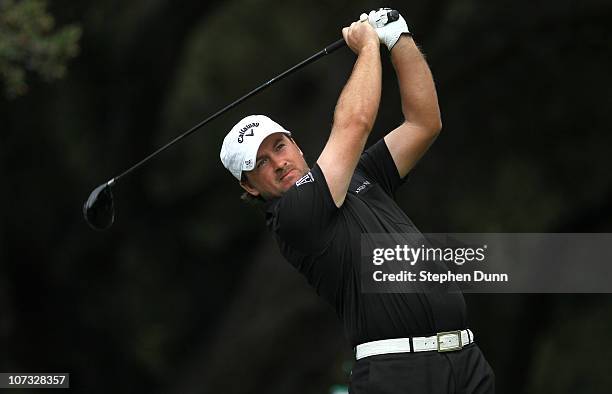 Graeme McDowell of Northern Ireland hits his tee shot on the sixth hole during round three of the Chevron World Challenge at Sherwood Country Club on...