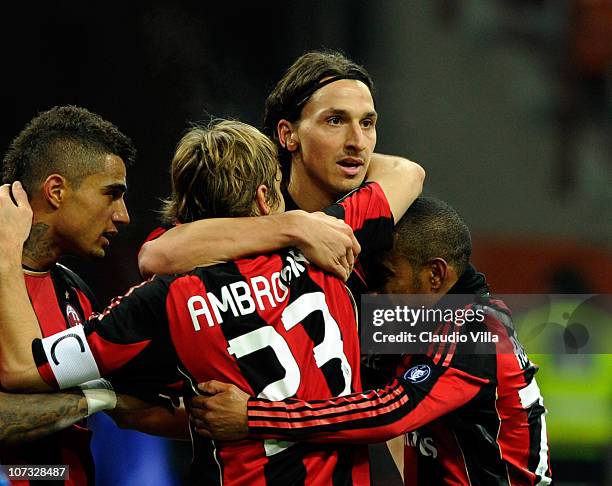 Zlatan Ibrahimovic, Robinho, Massimo Ambrosini and Kevin PrinceBoateng of AC Milan celebrates scoring the third goal during the Serie A match between...