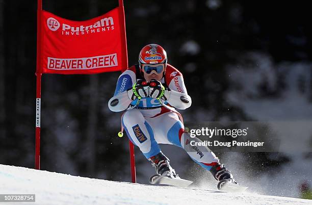 Didier Cuche of Switzerland skis to third place in the Men's Super Giant Slalom at the Audi FIS World Cup Birds of Prey on December 4, 2010 in Beaver...