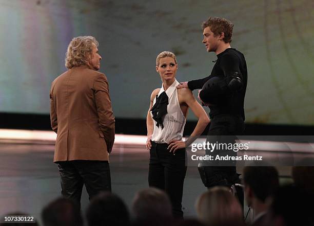 Hosts Thomas Gottschalk and Michelle Hunziker chat with Samuel Koch during the 192th 'Wetten, dass ...?' show at the exhibition hall Dusseldorf on...