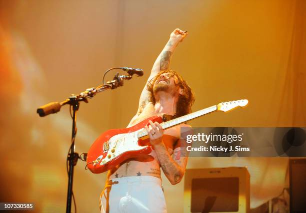 Simon Neil of Biffy Clyro performs on stage at Wembley Arena on December 4, 2010 in London, England.