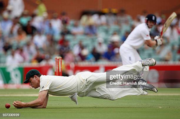 Marcus North of Australia mis fields a shot from Paul Collingwood of England during day three of the Second Ashes Test match between Australia and...