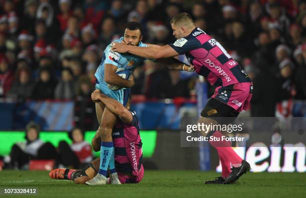 Gloucester player Ed Slater tackles Tom O' Flaherty of Exeter during the Champions Cup match between Gloucester Rugby and Exeter Chiefs at Kingsholm...