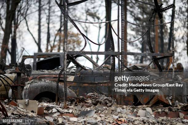 Classic car destroyed by the Camp Fire is seen in the town of Paradise, Calif., on Tuesday, Nov. 27, 2018. Numerous safety issues resulting from the...