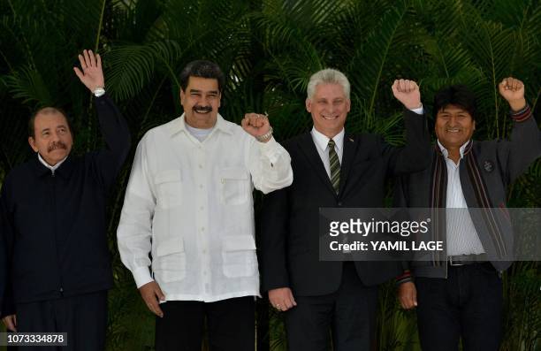 Nicaragua President Daniel Ortega, Venezuelan President Nicolas Maduro, Cuban President Miguel Diaz-Canel and Bolivian President Evo Morales pose for...