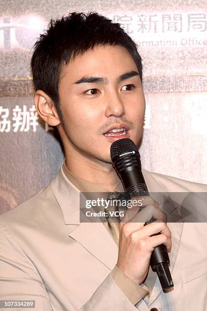 Taiwanese actor Ethan Ruan speaks to the media after winning the Best Film Music Award and Best Art Directors Award during the 54th Asian Pacific...