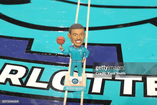 Bobblehead of Muggsy Bogues is photographed before the game between the Charlotte Hornets and New York Knicks on December 14, 2018 at Spectrum Center...