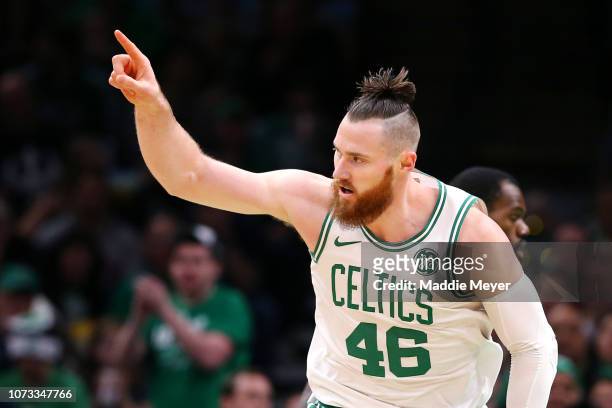 Aron Baynes of the Boston Celtics celebrates during the first quarter against the Atlanta Hawks at TD Garden on December 14, 2018 in Boston,...