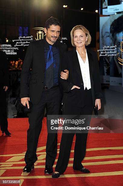 Actor Pascal Elbe and actress Marthe Keller attend the Tribute to the French Cinema during the 10 th Marrakech Film Festival on December 4, 2010 in...