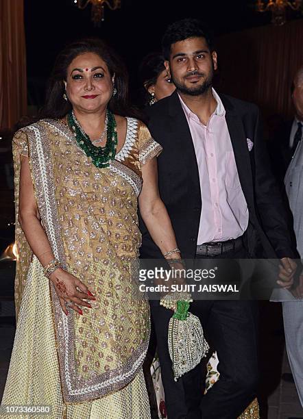 Indian Bollywood actress Tina Munim attends the wedding reception of Isha Ambani, whose father is tycoon Mukesh Ambani, with Anand Piramal, son of...