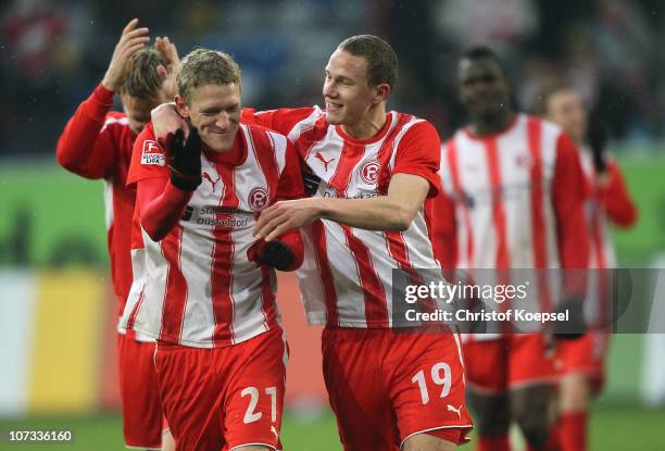 Johannes van den Bergh of Duesseldorf and Marcel Gaus of Duesseldorf celebrate the 1-0 victory after the Second Bundesliga match between Fortuna...