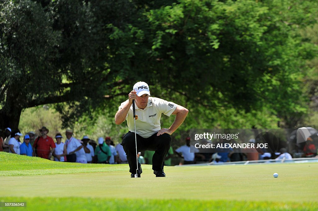 English golf champion Lee Westwood lines