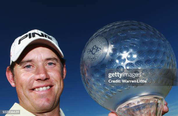 Lee Westwood of England poses with the trophy after winning the 2010 Nedbank Golf Challenge at the Gary Player Country Club Course on December 5,...