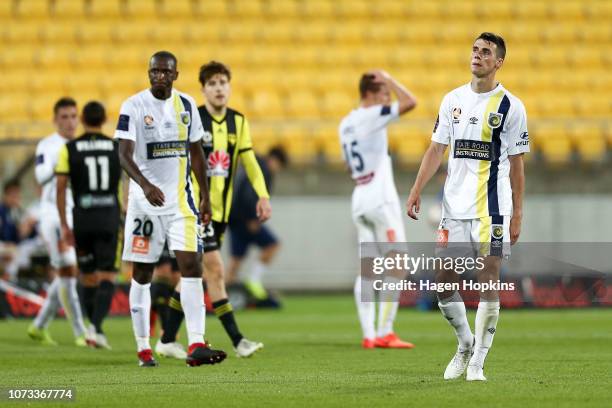 Jake McGing and Kalifa Cisse of the Mariners show their disappointment at the final whistle during the round eight A-League match between the...