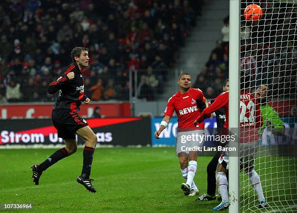 Stefan Reinartz of Leverkusen heads his teams third goal during the Bundesliga match between Bayer Leverkusen and 1. FC Koeln at BayArena on December...