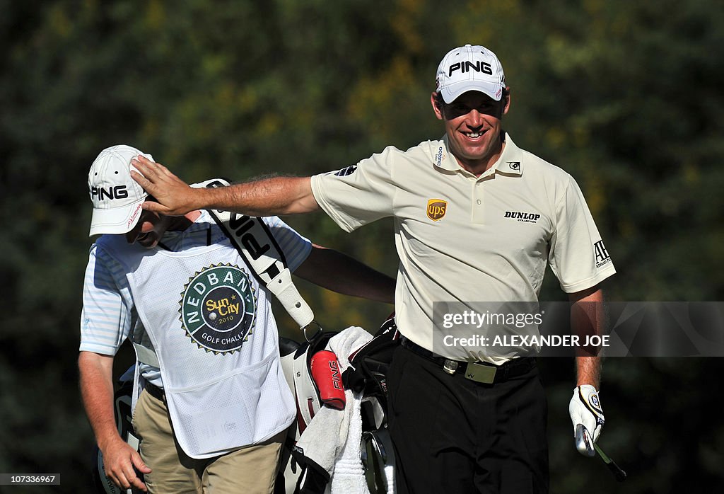 English Golf champion Lee Westwood (R) s